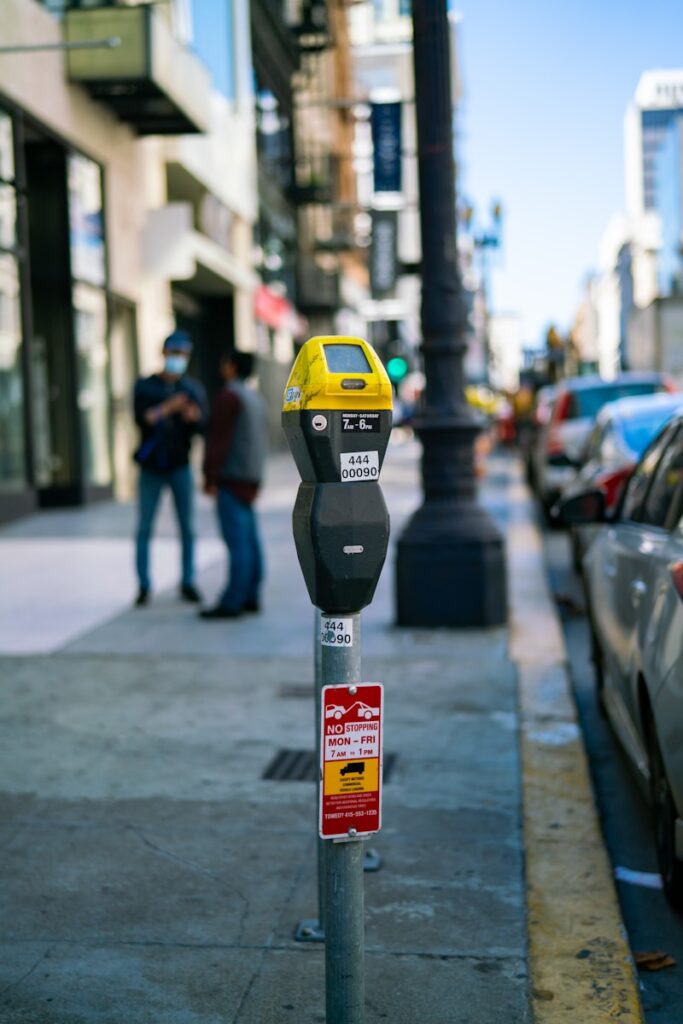 yellow and black parking meter